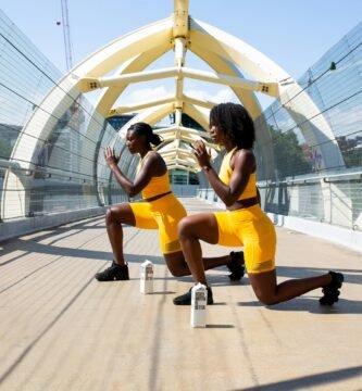 woman in yellow shorts sitting on yellow chair